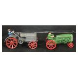 2 Cast Iron Tractors.