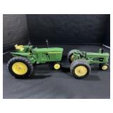 Pair Of Cast Metal John Deer Tractors.