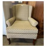 Upholstered Patterned Wingback Armchair.