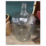 Glass carboy.