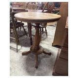 Round Wooden Pedestal Table.