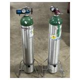 Pair Of Oxygen Tanks w/ Stands.