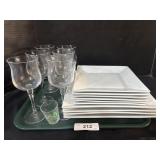 Porcelain Plates and Wine Glasses.