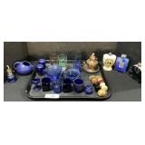 Cobalt Blue Glasses, Talcum Powder, Brushes.