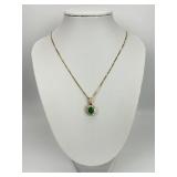 14KT Gold Emerald & Diamond Halo Pendant Necklace.