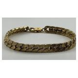 Gold Herringbone Link Bracelet.