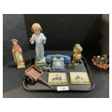 Souvenir Prints, Religious Figurines, Toy Phone.