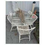 GlassTop Patio Table w/ Woven Vinyl Chairs.