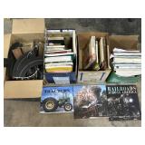 Books (Tractors, Guns, Trains) & Slot Car Track.