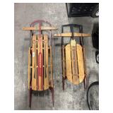 (2) Vtg Runner Sleds.