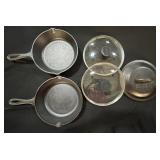 2 Lodge Cast Iron Pans & 3 Lids