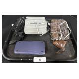 Handheld Camera, Garmin Unit, Calculator.