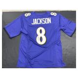 Autographed Lamar Jackson Football Jersey.