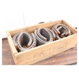 Wood Crate of Rough Horse Shoes