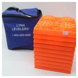 Orange LYNX LEVELERS in Zippered Storage Bag