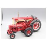 (2) Farmall McCormick Metal Tractors