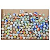 (51 +/-) Slag Glass Marbles & Shooters