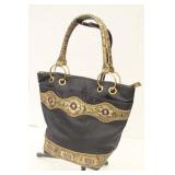 A Noatd Black & Gold Purse