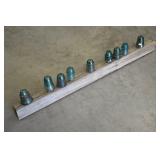 Insulator Collection on Wood Power Pole Bar