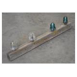Insulator Collection on Wood Power Pole Bar
