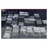 Large amount of new plastic silverware forks, and