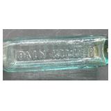 Antique painkiller glass bottle