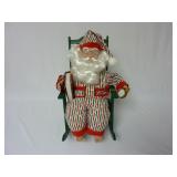 Sleeping Santa in a Rocking Chair