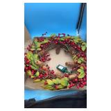 light up wreath with fake leaves and berries