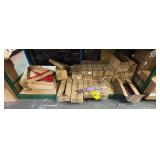 CONTENTS OF SHELF (RATCHET BINDERS, LEVER BINDERS, DOCK BUMPERS)
