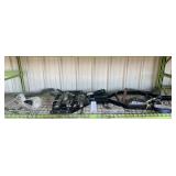 CONTENTS OF SHELF (MOWER BLADES, ETC.)