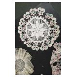 2 crocheted pillow cases & 3 doilies.