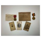 WWII ration book, Good Conduct medal, The Great War of Civilization medal