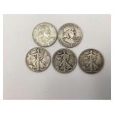 2 Ben Franklin half dollars