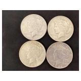 4 Peace silver dollars. 1922, 1922, 1925, 1934