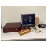 Coin display boxes and books