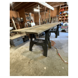 (2) 9' slabs of rough sawn oak and pair of plastic saw horses