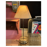 Shelf and contents, glass blocks, lamp, quartz clock