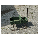 Wooden wagon with metal wheels, 21' L x 10' W.