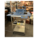 Metal framed production cart and contents