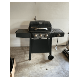 Backyard propane grill with side burner and shelf