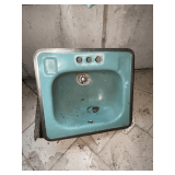 20' W x 18' D cast iron Kohler sink with metal trim.