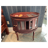 Oval curio cabinet with bevel glass, 31' W x  19 ' D x 30' T