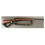 Military rifle that has been sportified, possibly 8mm, peep sights, 24 1/2' barrel, leather sling