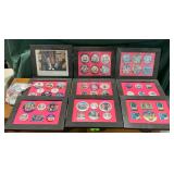 Political buttons and framed photos.
