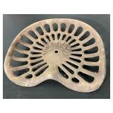 Deering cast iron implement seat