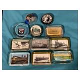 Assortment of transportation glass paperweights