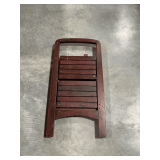 Folding wooden step stool.