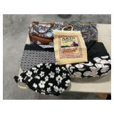 Assortment of purses and handbags.