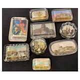 Assortment of government themed glass paperweights