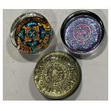 Trio of colorful paperweights
